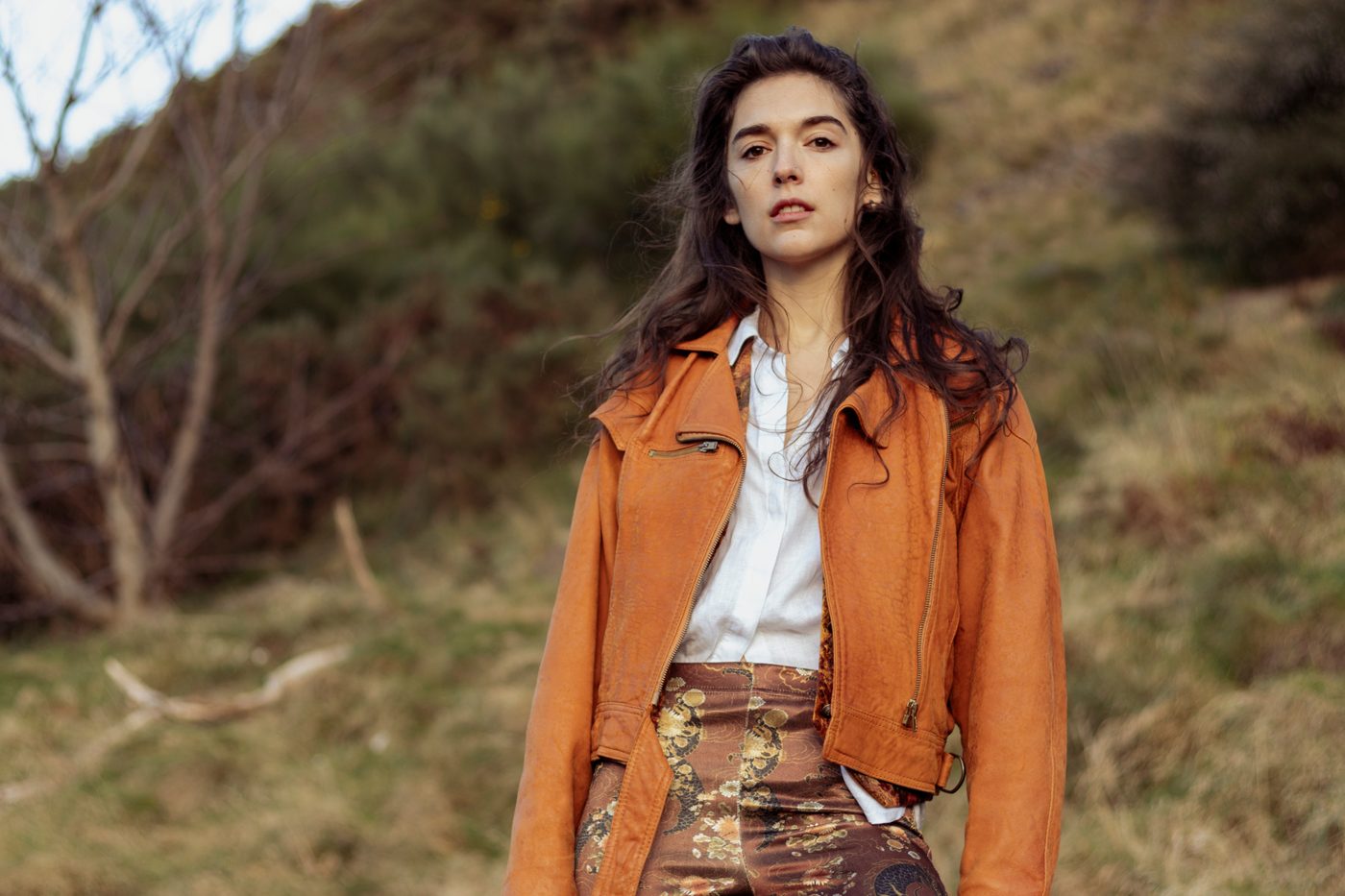 Rust leather jacket on a moorland hillside